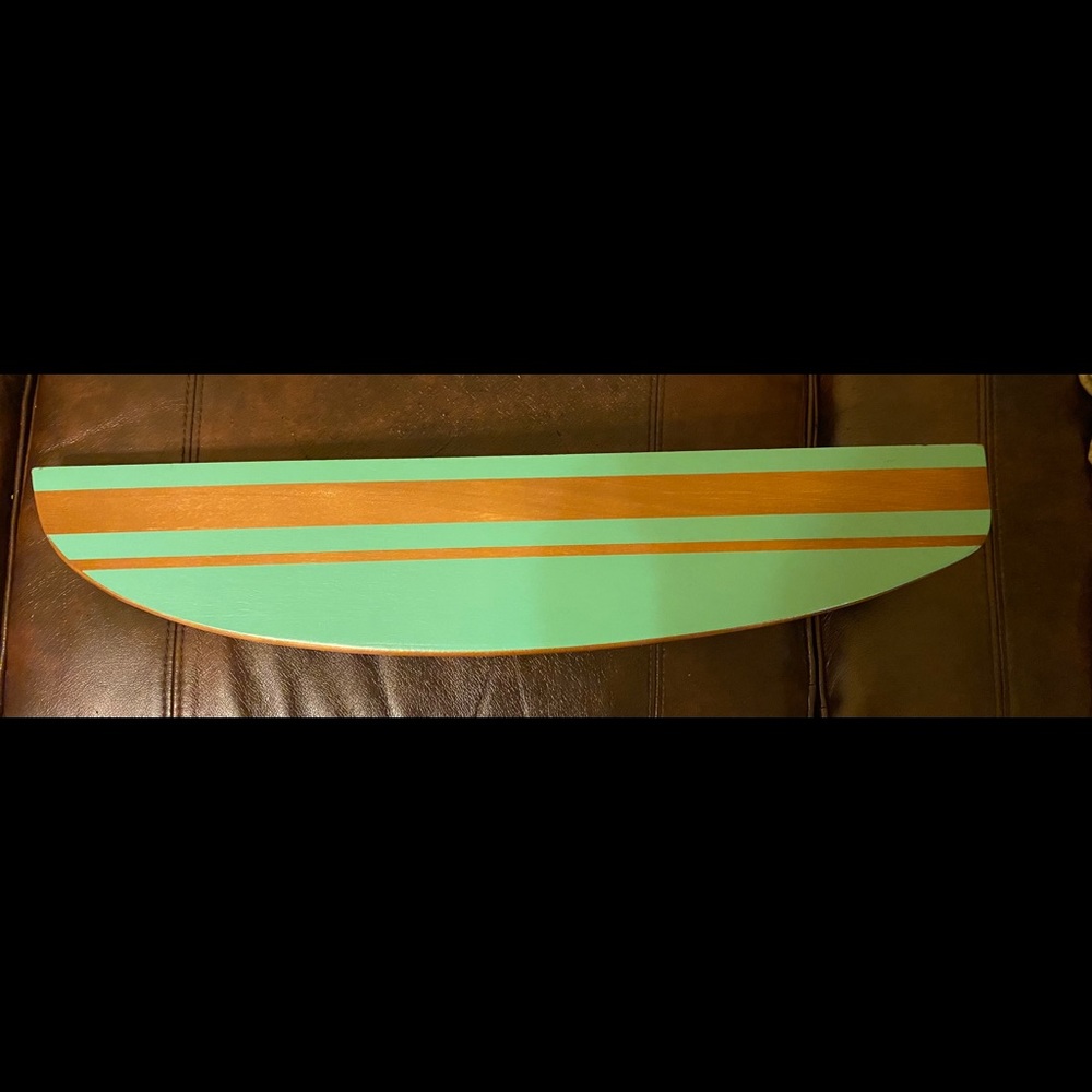 Wooden surf board shelf